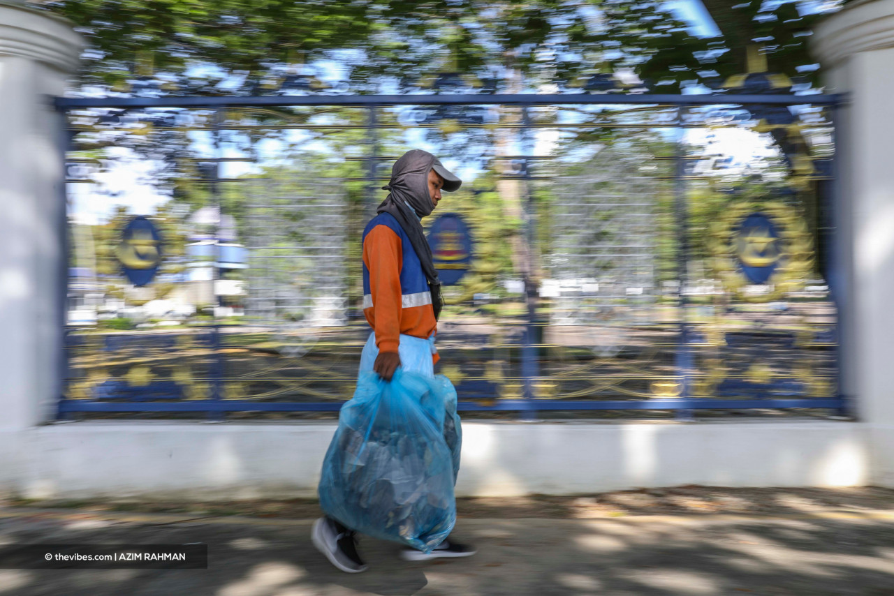 Cleaning workers are also vulnerable to Covid-19 outbreaks if they are not careful. – AZIM RAHMAN/The Vibes pic, June 4, 2021