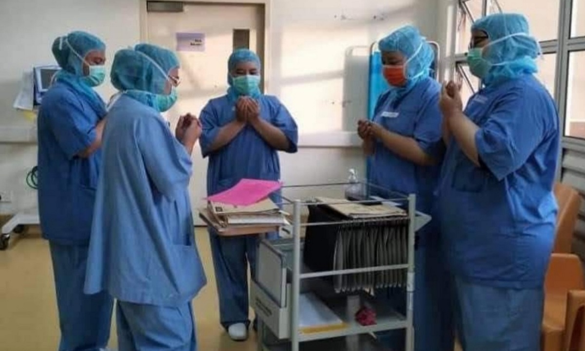 Medical frontliners praying before starting their duties in the Covid-19 ward. – Screen grab, May 9, 2021