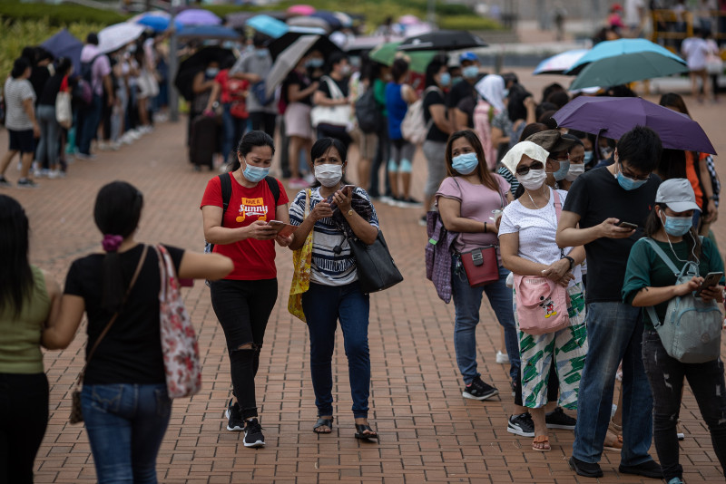 HK bins plan to make Covid-19 jab a must for foreign maids