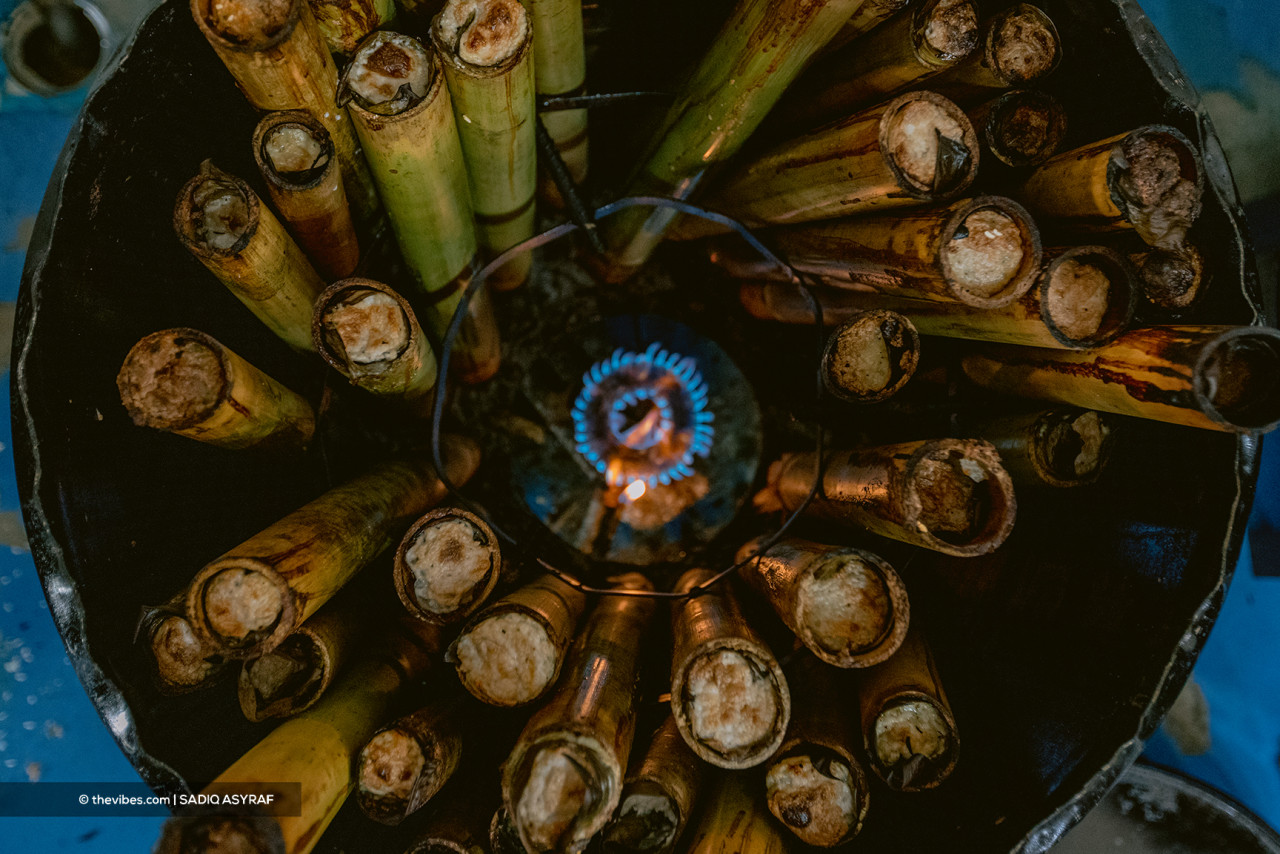 Traditional lemang placed under heat in drums to speed up the cooking process. – SYADIQ ASYRAF/The Vibes, May 13, 2021