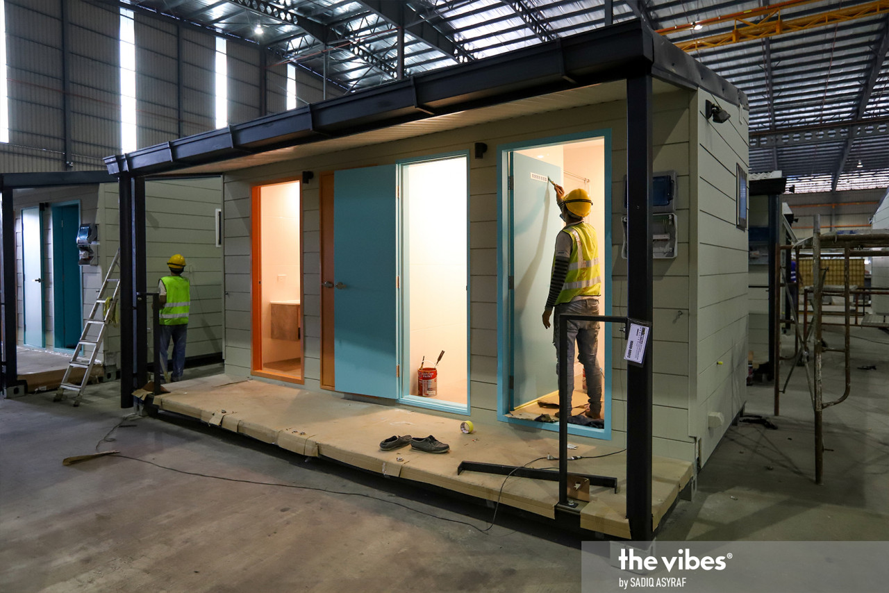 Petra Modular employees putting the finishing touches on modular units at the company’s Telok Gong facility. – SADIQ ASYRAF/The Vibes pic, March 4, 2021