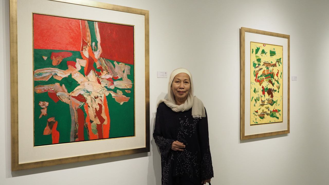 Sharifah Fatimah with some of her works. – Pic courtesy of G13 Gallery