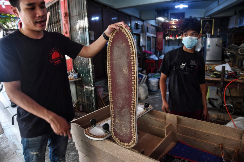 Thai coffin-maker kickflips his caskets into skateboards