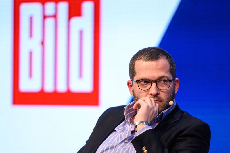 German paper’s chief steps aside amid probe into affairs with interns