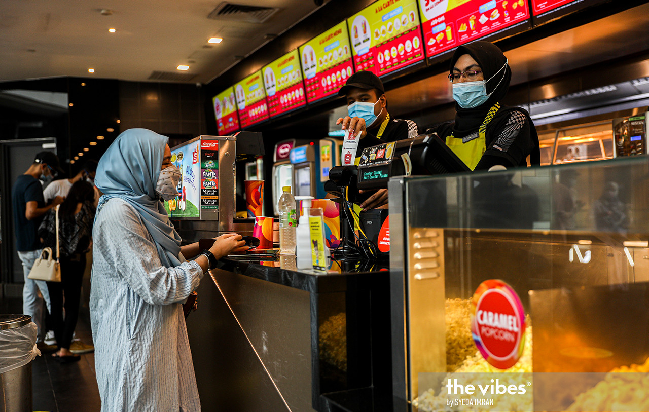 Watching a movie at the cinema would not be complete without concessions, especially popcorn. – SYEDA IMRAN/The Vibes pic, March 6, 2021