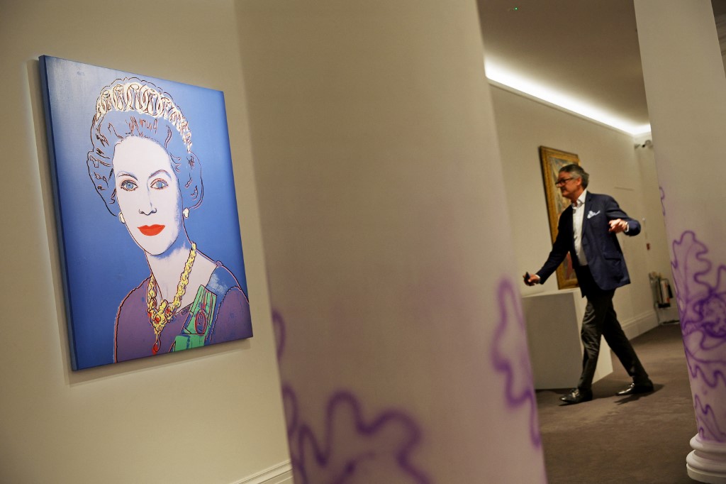 'Reigning Queens: Queen Elizabeth II of the United Kingdom' by Andy Warhol, is seen during a photocall to promote Sotheby's Jubilee Season, in central London on May 27.
