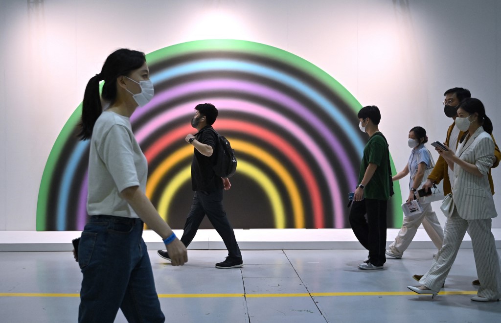 Visitors walks past artwork 'vierzehnterseptemberzweitausendundfunfzehn, 2015' by artist Ugo Rondinone during the Frieze Seoul 2022 art fair in Seoul on September 2. – AFP pic