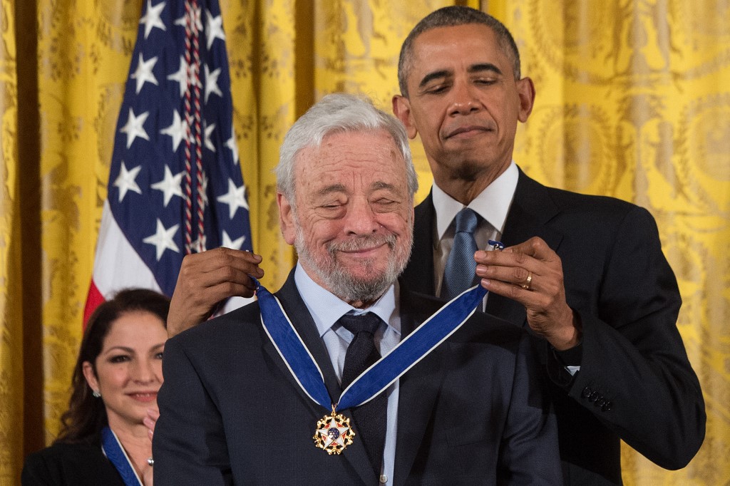 US President Barack Obama presents the Presidential Medal of Freedom to theater composer and lyricist Stephen Sondheim at the White House in Washington, DC, on November 24, 2015. – AFP pic