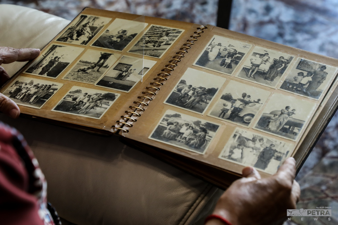Datuk Pardip Kumar Kukreja reminisces as he looks through old photos. 