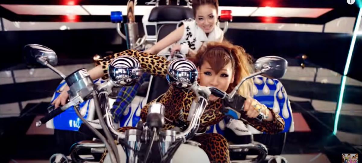 CL and Dara on a monster bike in their music video Follow Me. – YouTube screengrab