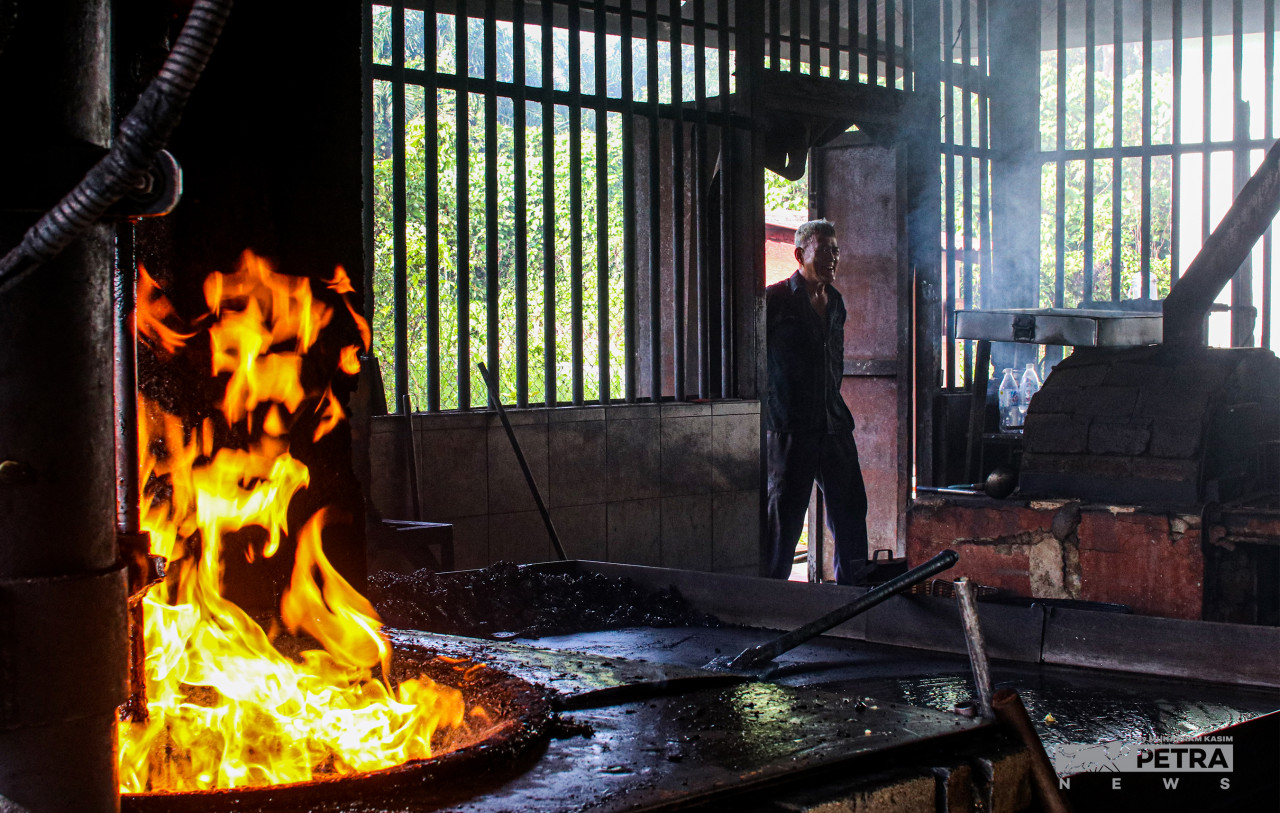 Tan Loon Chuan enters the factory to make the day's Chuan Hoe Coffee. – The Vibes pic/Muharram Kasim