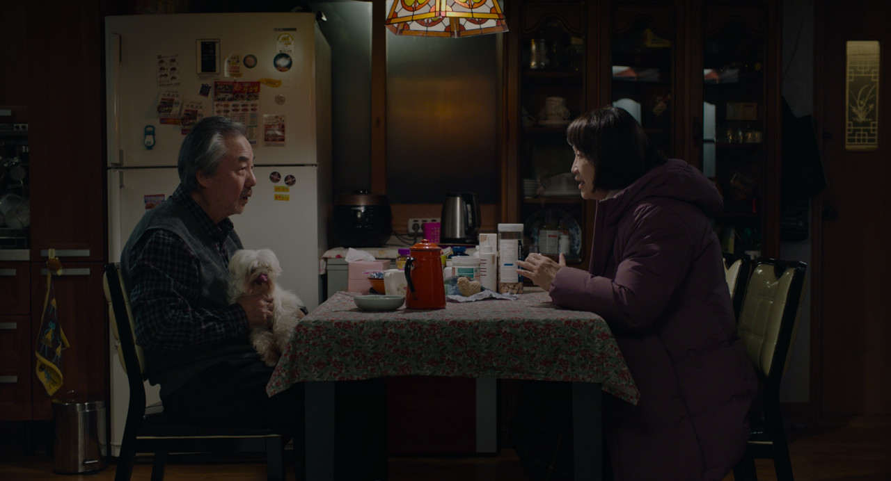 Auntie attempts to communicate with Jung Su, despite not sharing a common language. – Courtesy GSC Cinemas