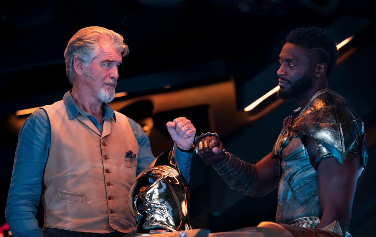 Doctor Fate/Kent Nelson (Pierce Brosnan) and Hawkman/Carter Hall (Aldis Hodge) are standouts as the two senior members of The Justice Society. – Pic courtesy of Warner Bros