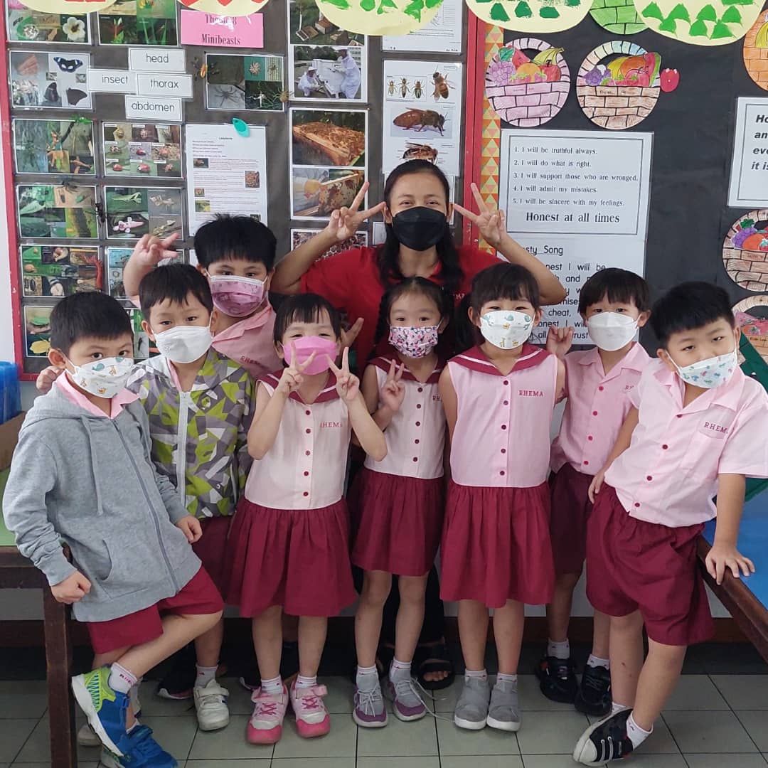 Carolyn Kaloni (middle) has found herself a niche in education. She is pursuing academic courses to fulfill her aspiration of becoming a full-fledged educator. – pic courtesy of Carolyn Kaloni
