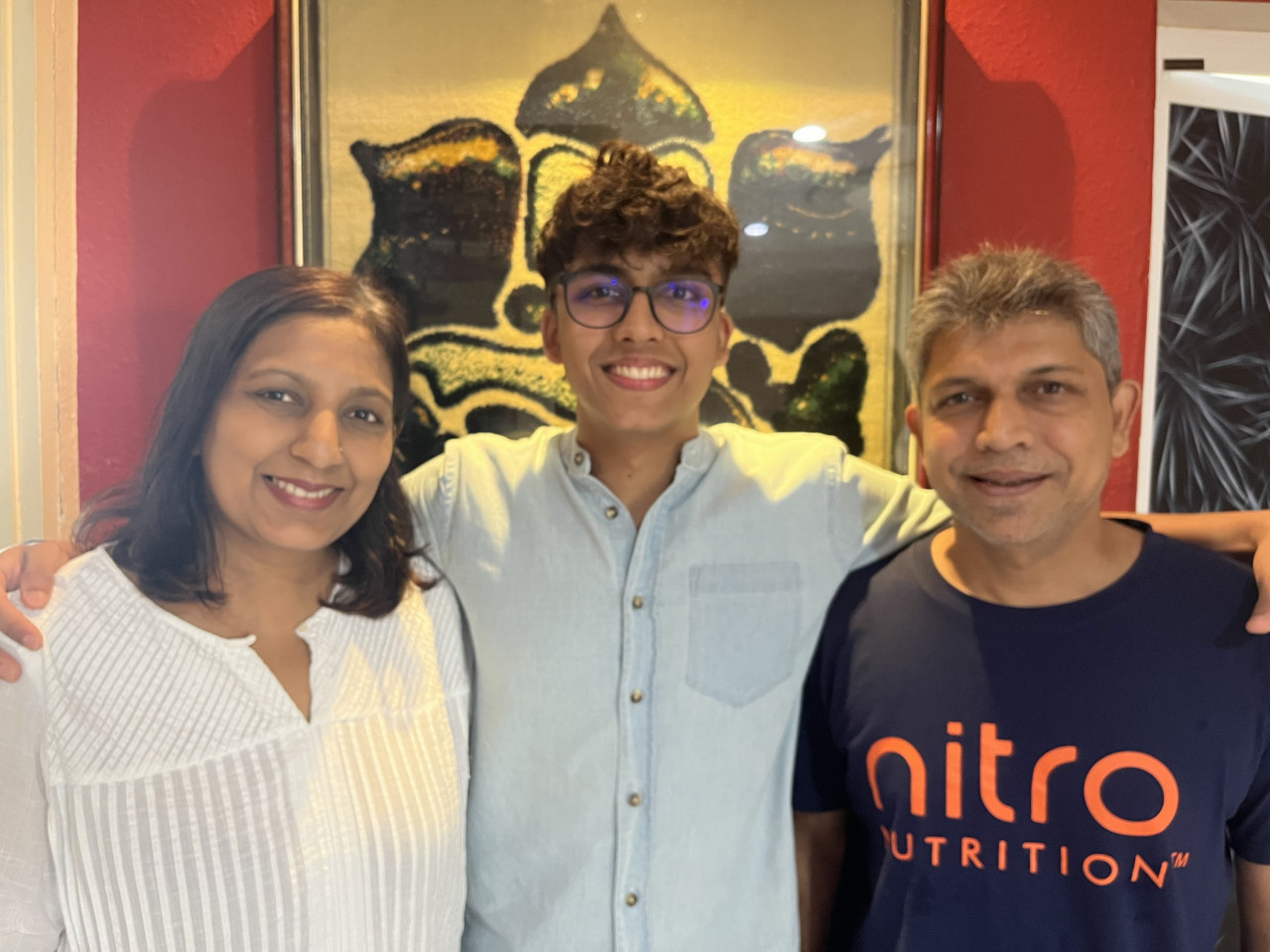 (L-R) Ishant's mum, Bharati Suresh Chand, Ishant himself, and his father, Atul Kumar. – Rachel Yeoh pic
