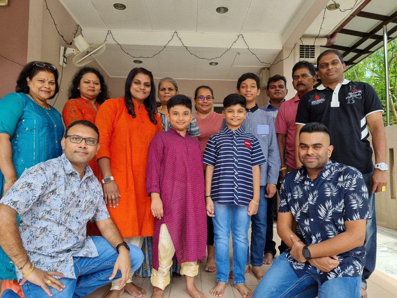 Like many other Malaysians, Praveen Kumar Venktasalam (seated, right) is able to finally reconnect with his relatives for the first time in over a year. – AMAR SHAH MOHSEN/The Vibes pic, November 5, 2021