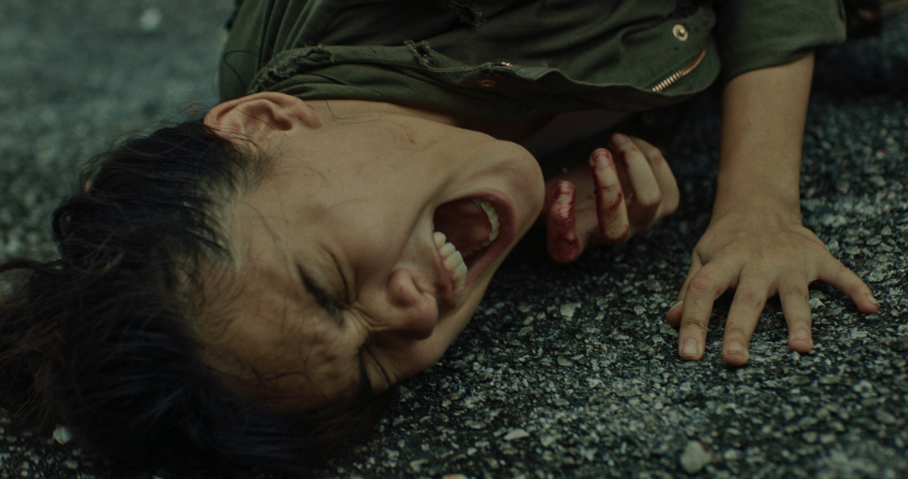 Mia Sarah Shauki plays Aisyah, one of six survivors hiding out in an abandoned shoplot. – Pic courtesy of Netflix