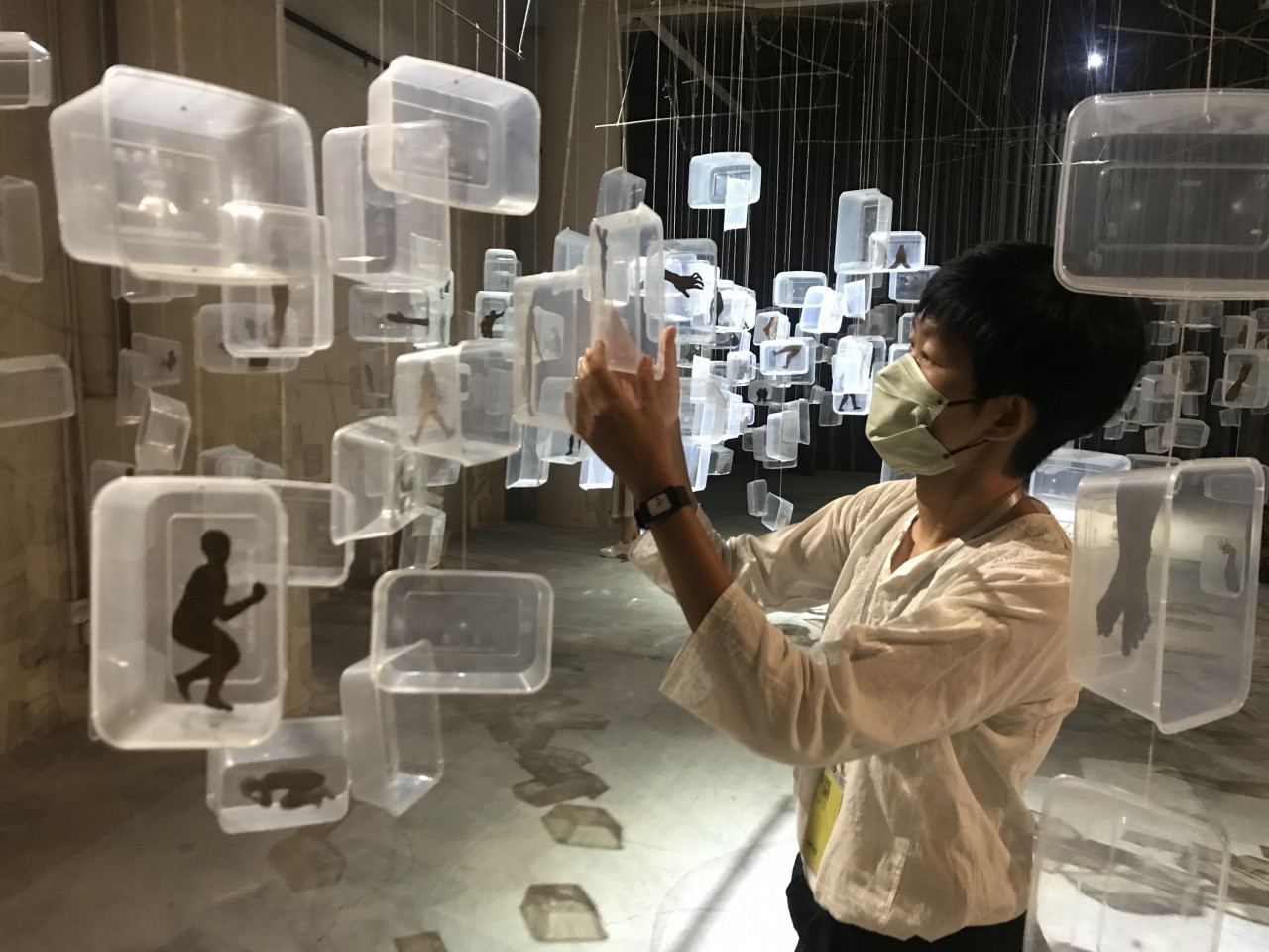Tan showing a part of the exhibition. – Pic courtesy of Tan Lay Heong