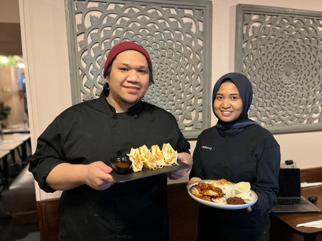 Business partners behind Rendang, Muhammad Ehsan and Nurul Adila show off some of their food. – WhatsApp pic 