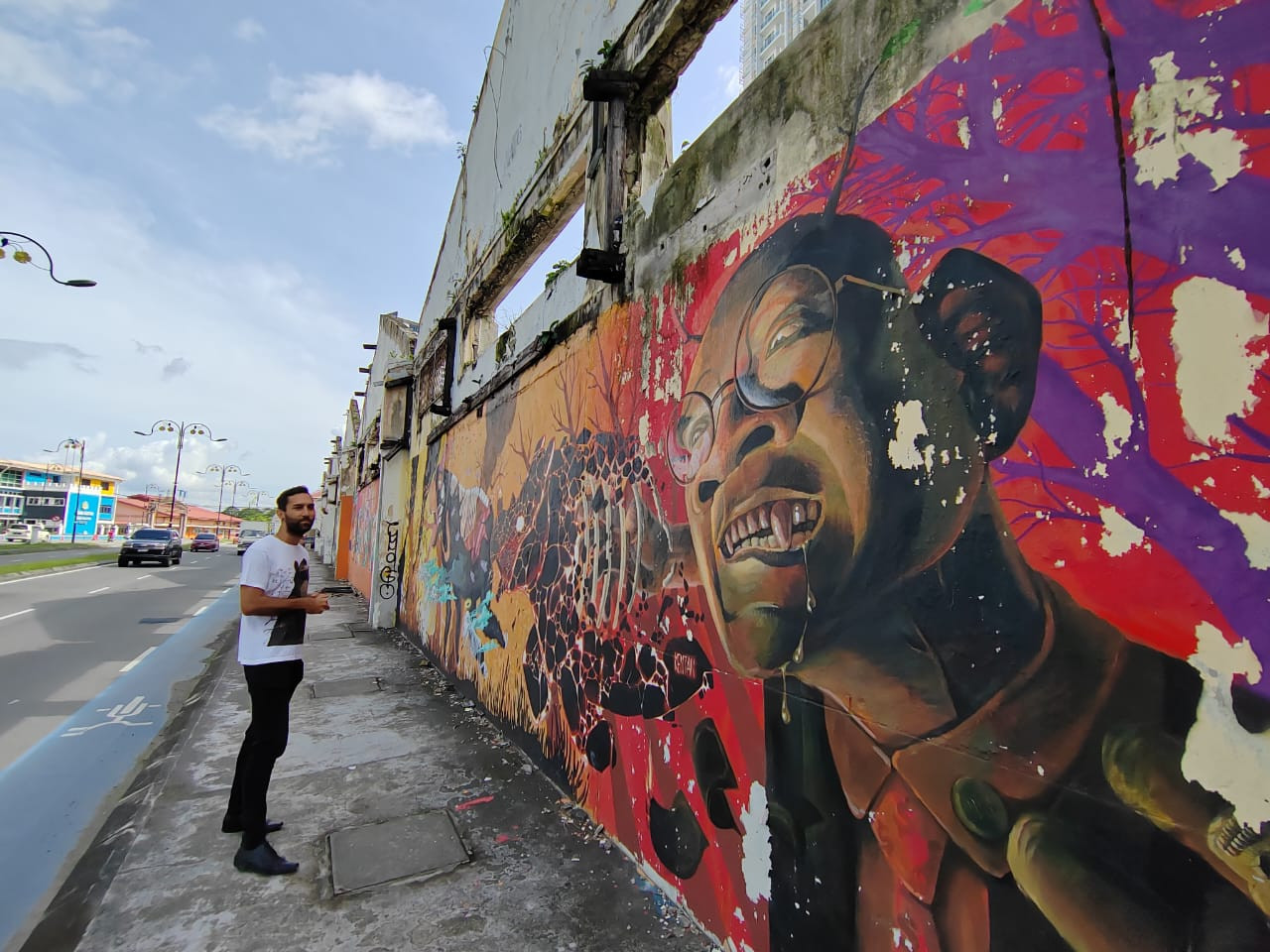 Jared Abdul Rahman gives guided tours of the street art scene in KK. – Shazmin Shamsuddin pic