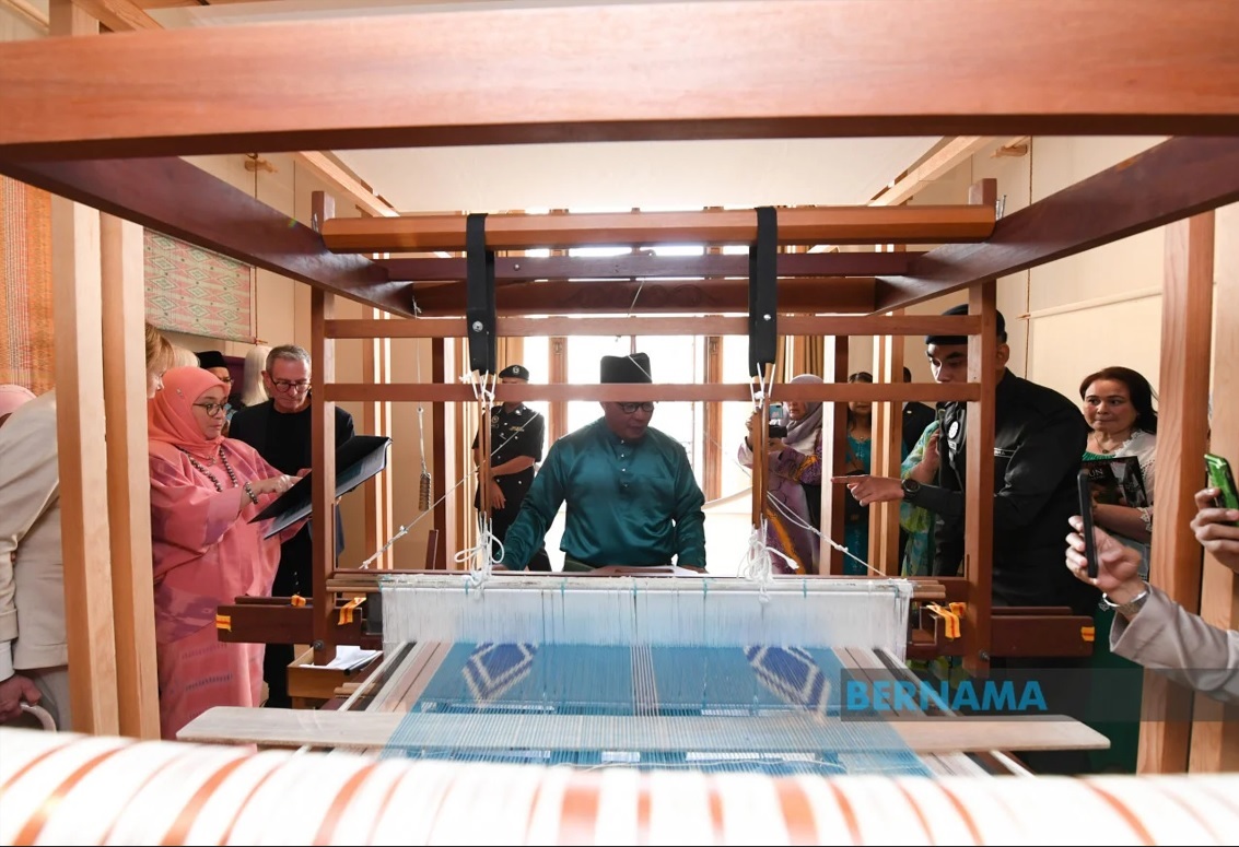 A traditional floor-loom display with a weaver at task will show visitors how the traditional fabric is made. – Bernama pic