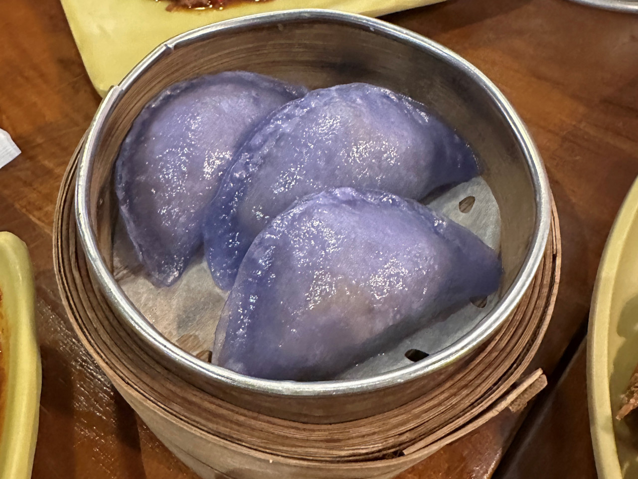 Despite the purple colour out of science fiction, the Kerabu Chicken Dumpling is filled with traditional Malaysian flavours. – Pic by Haikal Fernandez