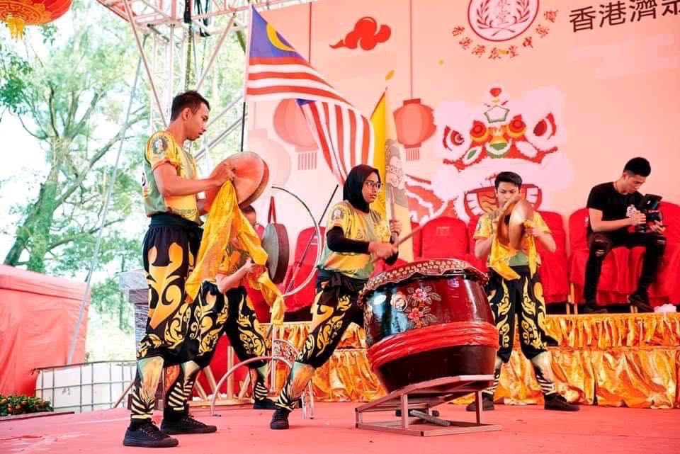 Mariam Abdul Nazar (centre), 27, has been lion dancing since she was just 13 years old. – Pic courtesy of the Khuan Loke Dragon and Lion Dance Association