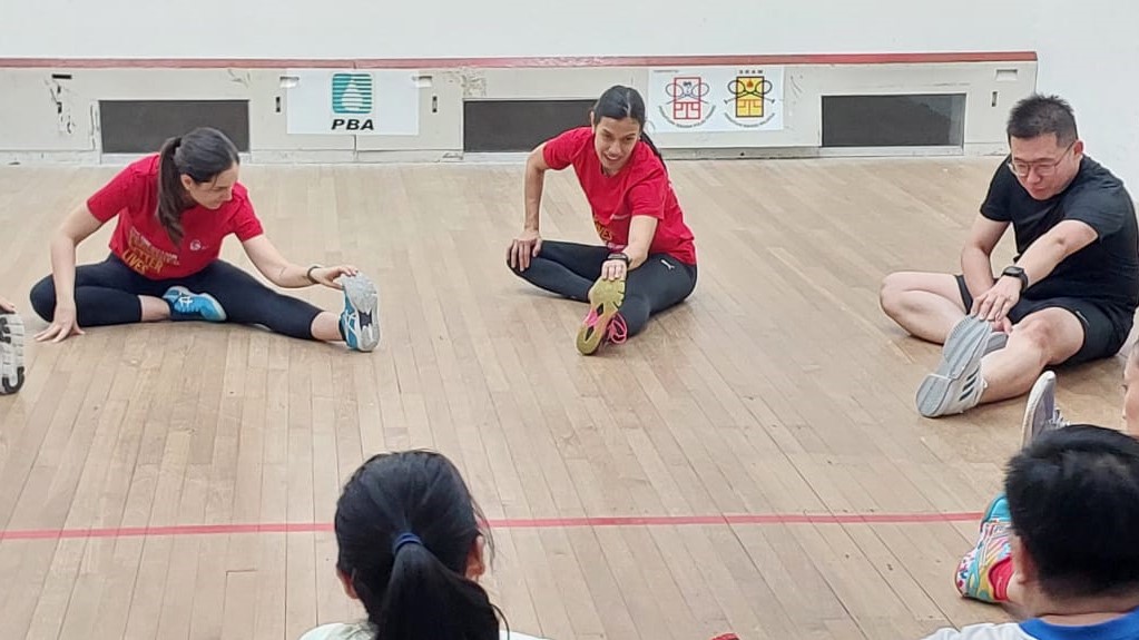 Nicol stretches to warm up. Not just focused on squash, the former champion wants to instill the importance of fitness to all Malaysians. – Ian McIntyre pic