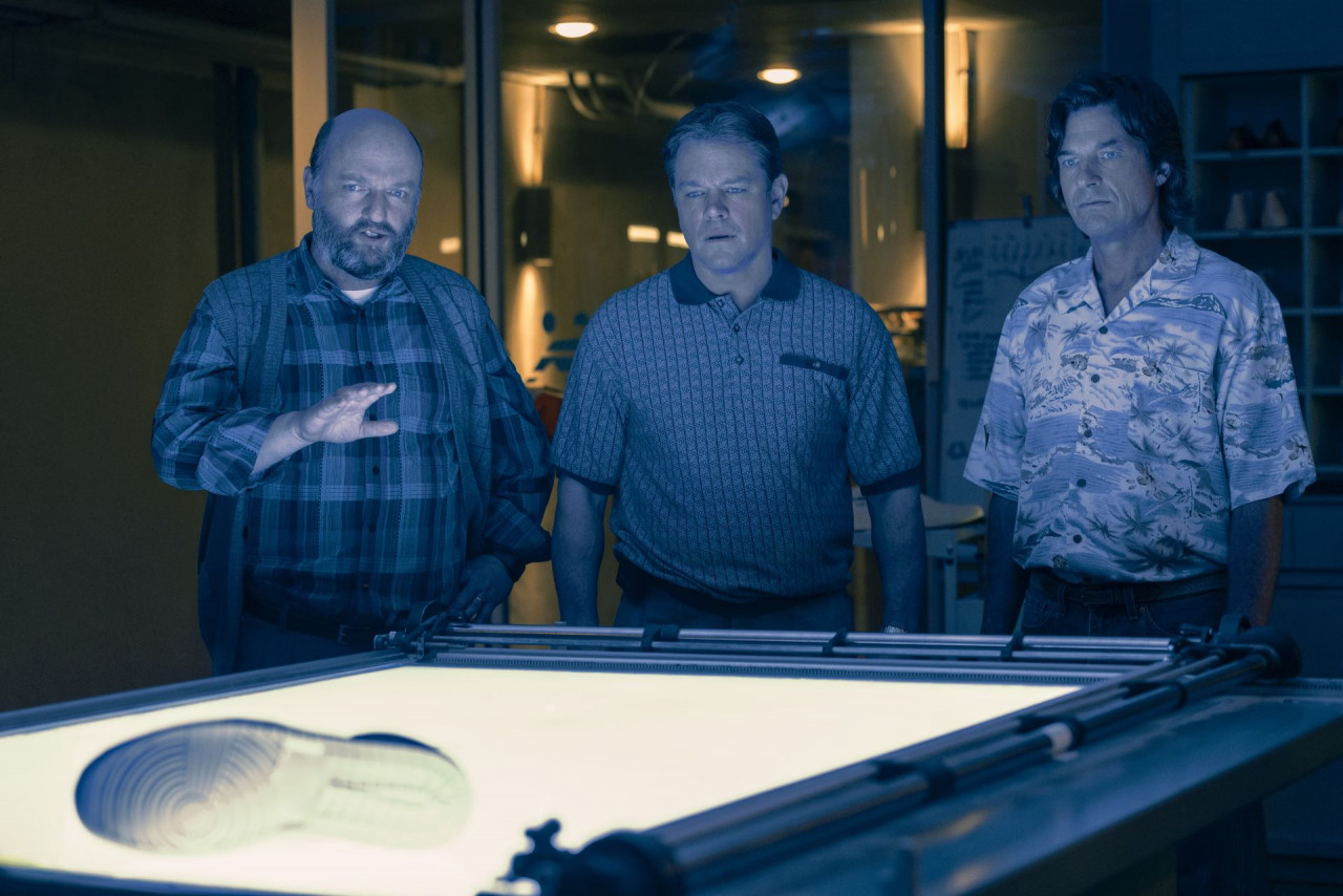 Air Jordan designer Peter Moore (Matthew Maher) explains the process behind making the iconic sneaker. – Pic courtesy of Warner Bros