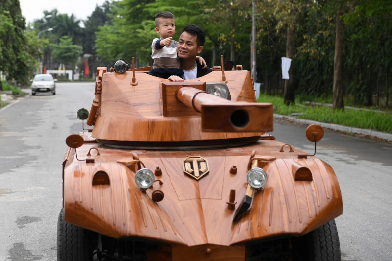 Vietnamese dad spends thousands to convert van into wooden tank for son