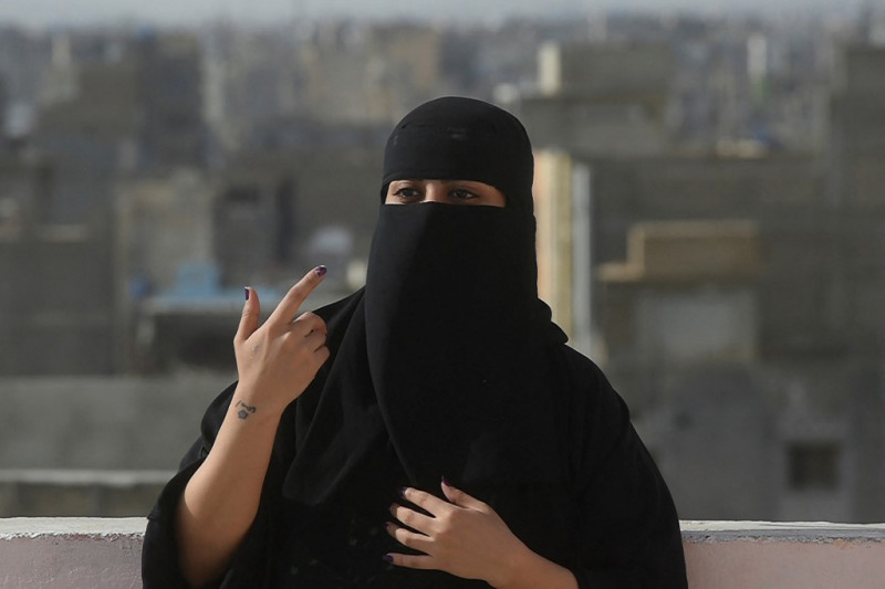 Behind the veil: The double life of Pakistan rapper Eva B
