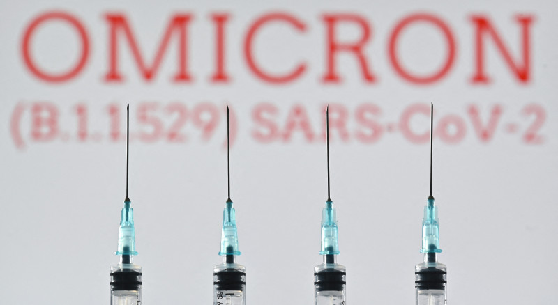 Weaker virus? Herd immunity? Omicron sparks cautious hopes