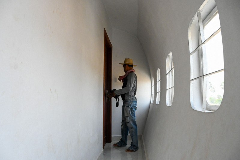 Cambodian man lands 'airplane' house in rice field