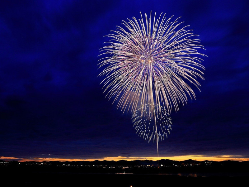 New Year parties slashed as Covid wave hammers the world