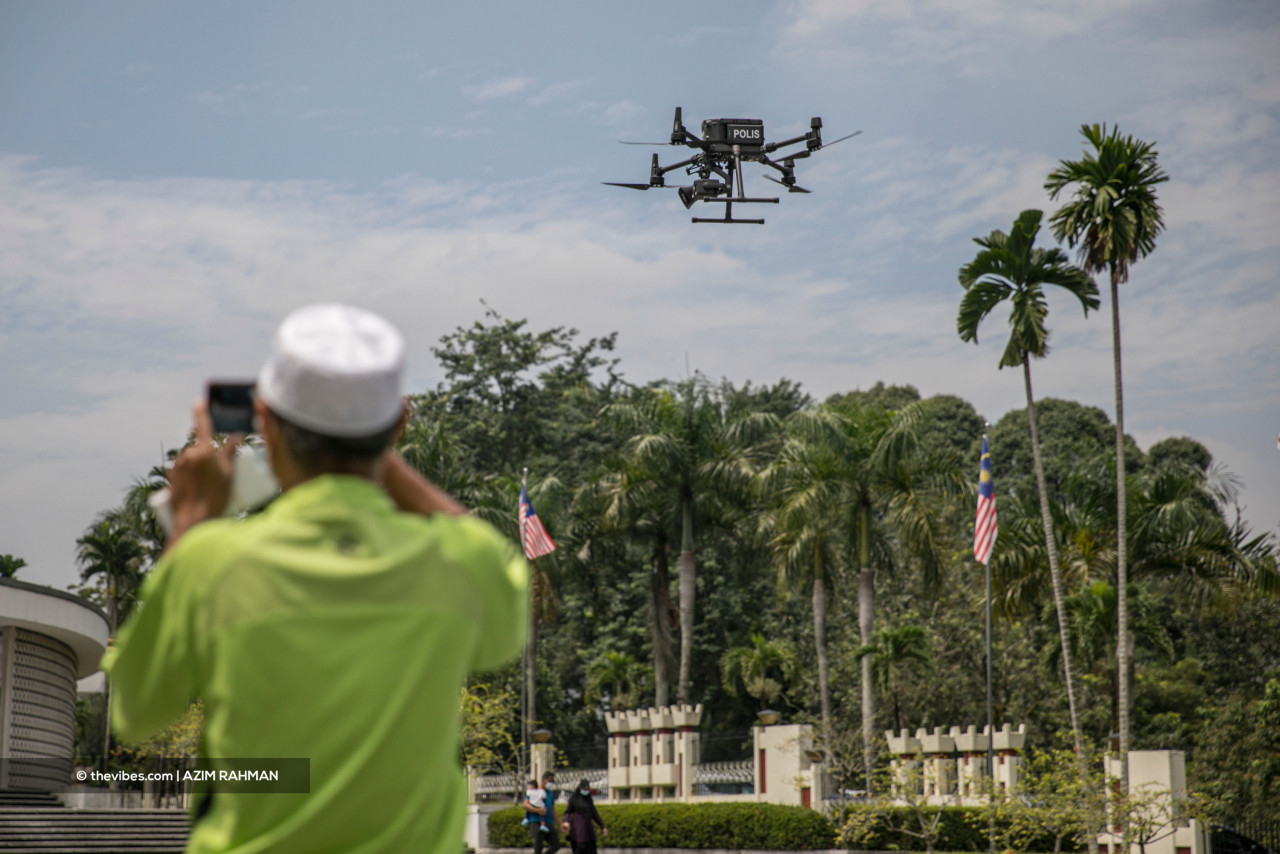 Cops assure members of the public that they do not need to worry if they see monitoring drones in public places. – AZIM RAHMAN/The Vibes pic, October 9, 2021