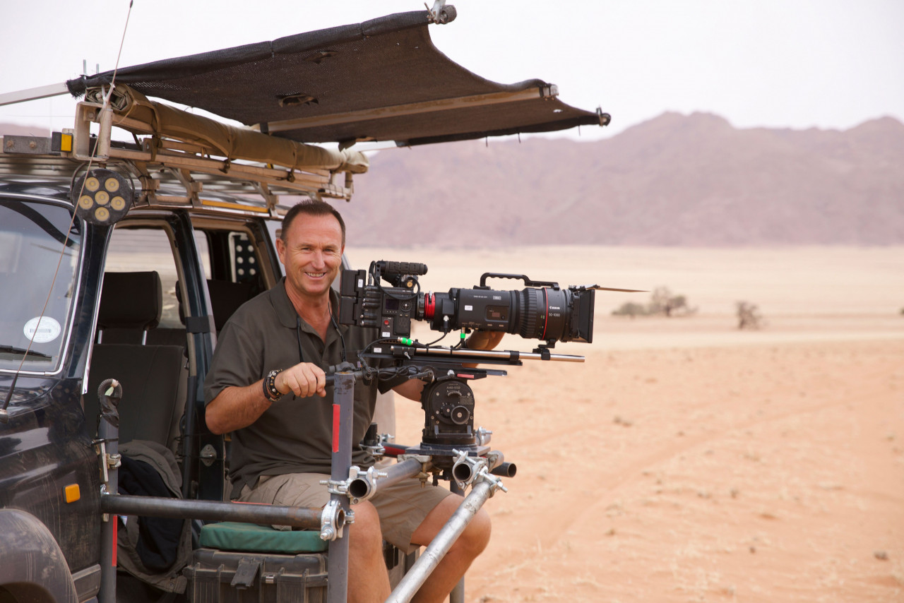 A specially adapted filming vehicle with a scaffolding rig built to carry the Cineflex camera on the plains of the Masai Mara. The Cineflex allows for quick response, filming on the move whilst the team followed and filmed herds of topi antelope in the African plains.