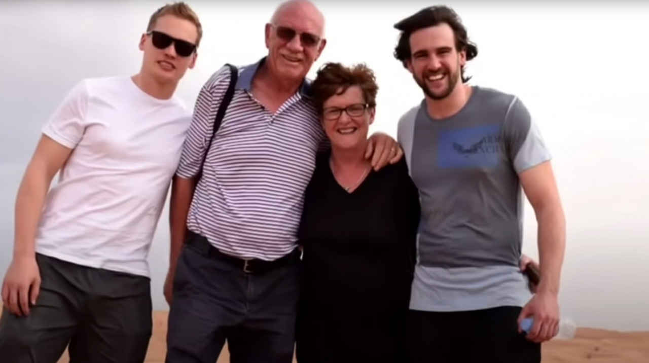 Gretta (2nd from R), her husband Ray, and their two sons during happier times. Initially having a two year placement in Malaysia, they ended up staying there for 17 years. – YouTube screengrab, October 17, 2021