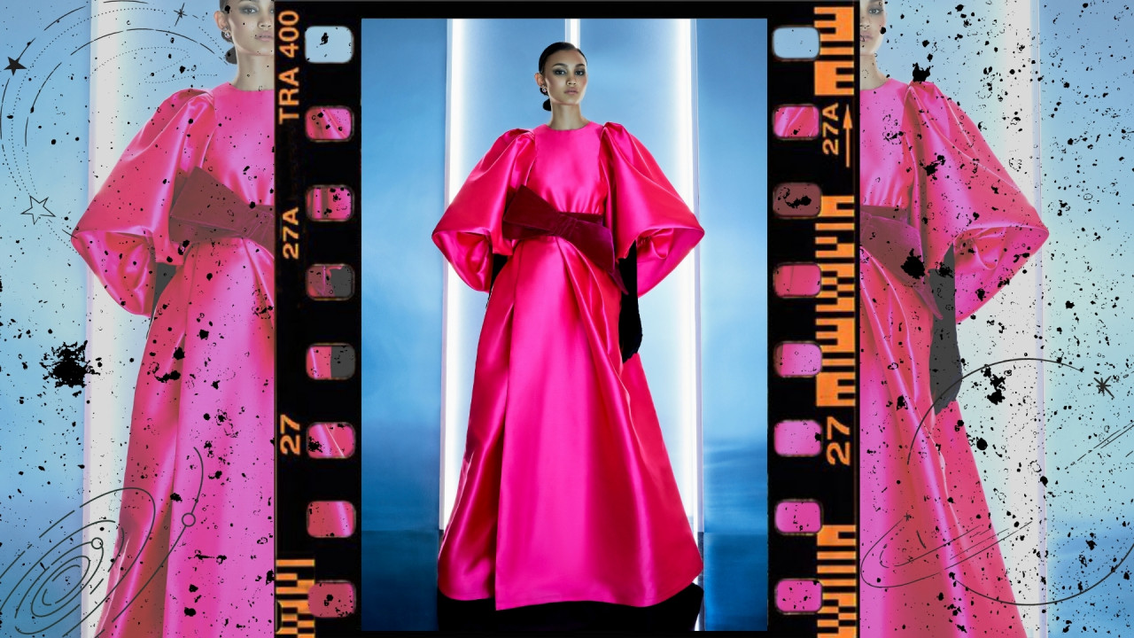 ‘Maia’. Voluminous ball gown in bright fuchsia taffeta with exaggerated cape sleeves, enhanced with a double bow velvet belt. — Pic courtesy of Khoon Hooi