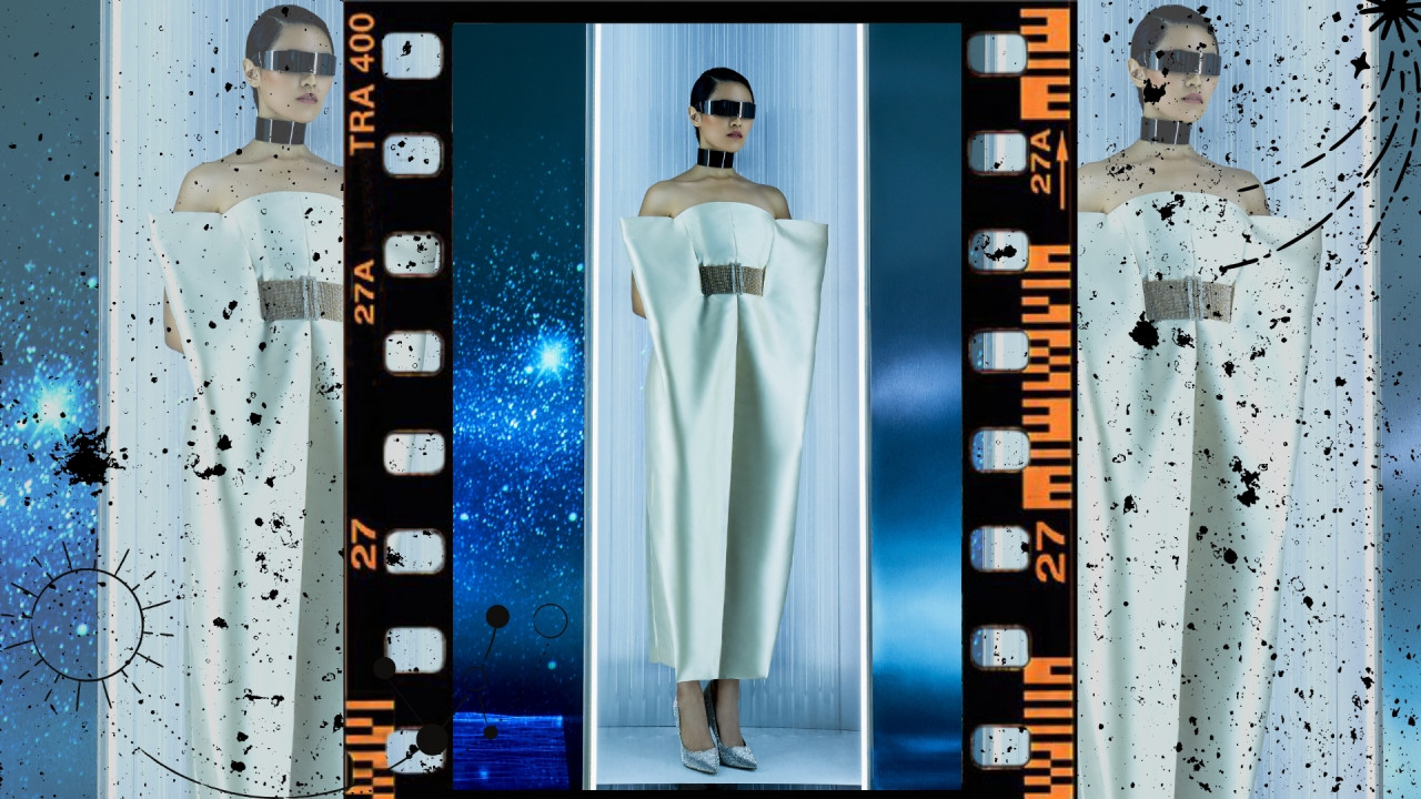 ‘Gaia’. Statuesque futuristic gown in ivory shine taffeta, crafted with creative folds and enhanced with a diamante rhinestone mesh buckled belt. — Pic courtesy of Khoon Hooi