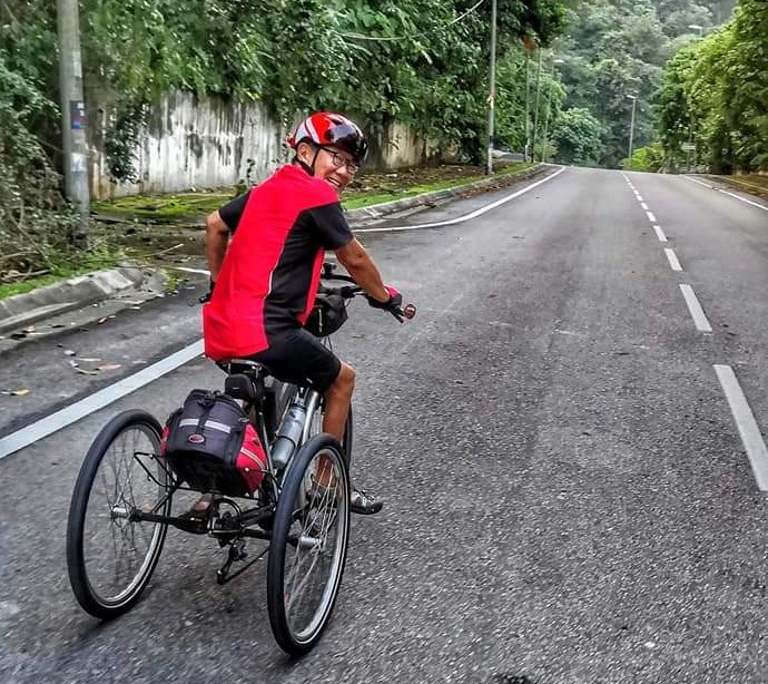 Patrick Teoh, an ardent cyclist, says that polio has not made an impactful difference in his life and profession, and was not hindered from what he wanted to do. – Patrick Teoh Facebook pic, October 24, 2021