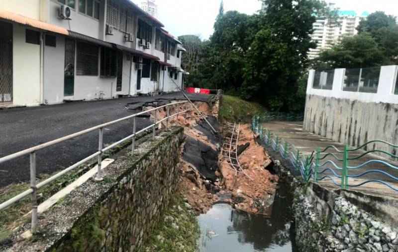 Road collapses during landslide in Penang