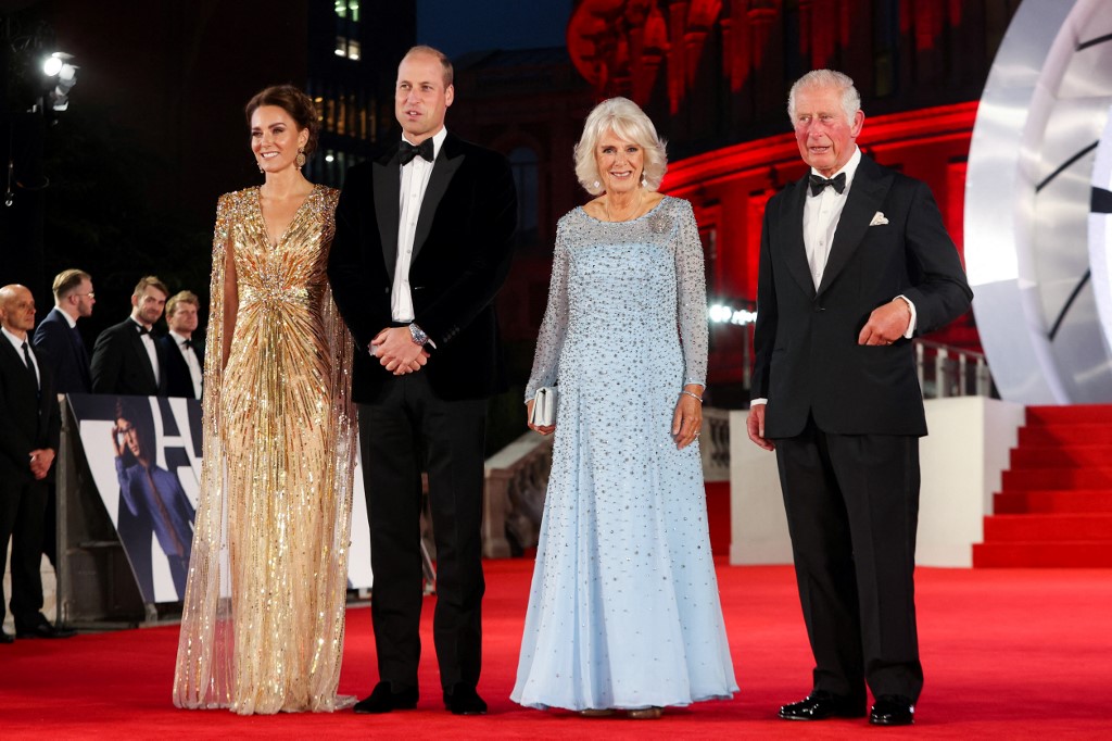 Prince William, Duke of Cambridge (second from left) and Catherine, Duchess of Cambridge (left) standing with Prince Charles, Prince of Wales (right) and Camilla, Duchess of Cornwall as they arrive for the World Premiere of the James Bond 007 film 'No Time to Die'. – AFP pic