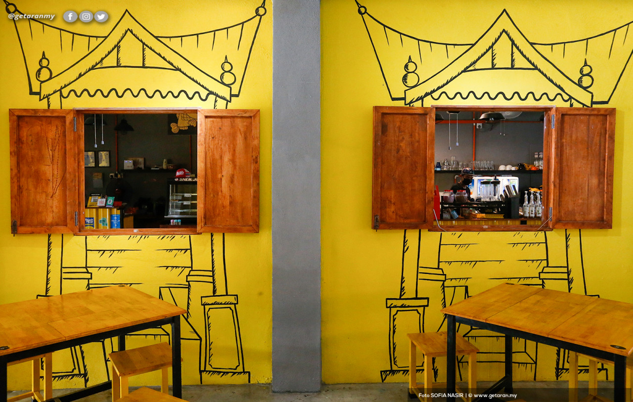 The rural-style interior decoration features murals of Tanjung Life and Minangkabau characters by cartoonist Azmi Hussain. – SOFIA NASIR/Getaran pic