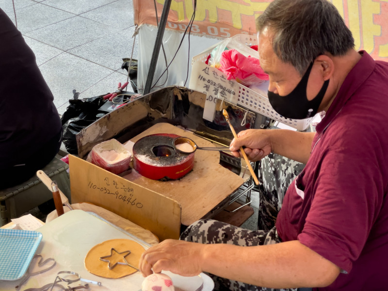 Sweet taste of Squid Game success for South Korean candy couple