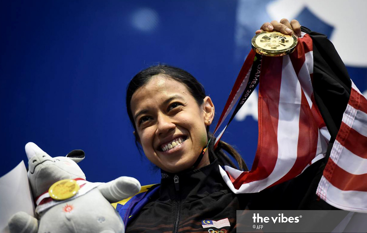 Stampin MP Dr Kelvin Yii says Datuk Nicol David inspired other Malaysian athletes, continuing to compete at the highest levels even after receiving a datukship. – AFP pic, May 8, 2021