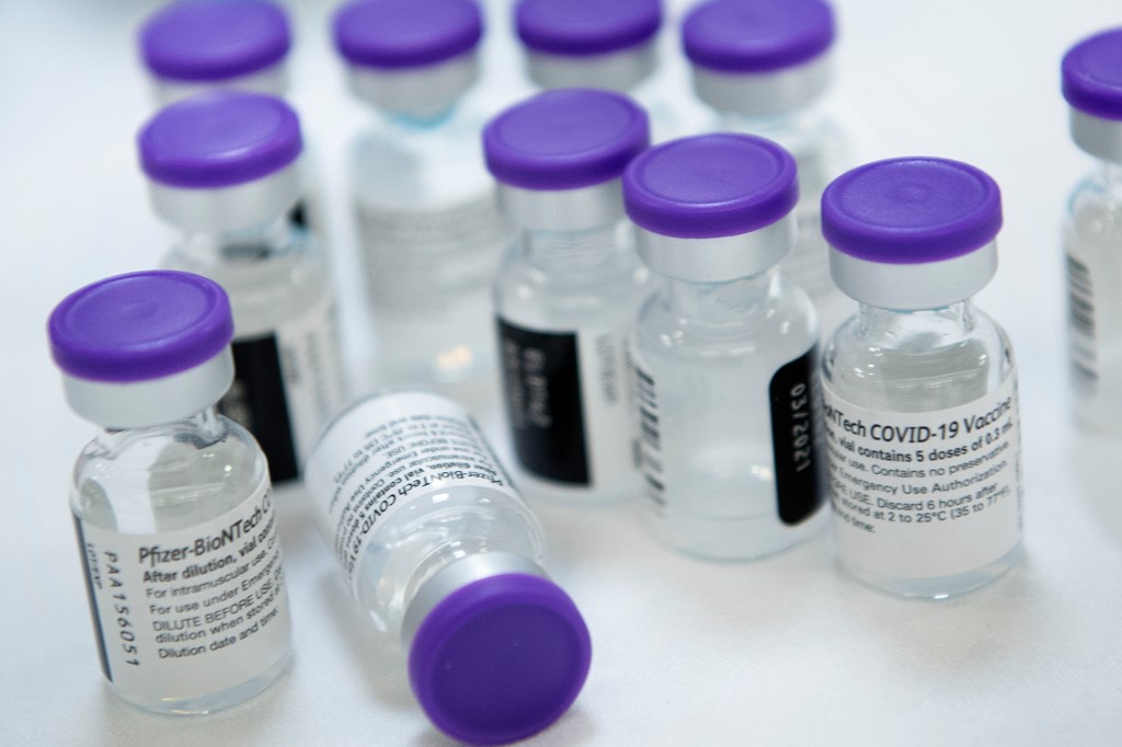 Mother of two, Nur Shakirah Ahmad, says she is waiting for when the Sinovac vaccine is dispensed to children because she believes the Pfizer vaccine may be too ‘strong’ for kids. – AFP pic, February 15, 2022