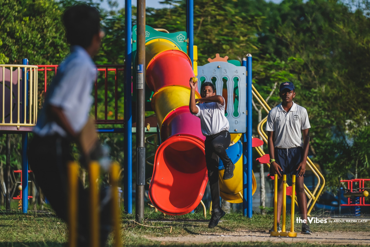 The young cricket players practising in close proximity to the slide and seesaw. – ABDUL RAZAK LATIF/The Vibes pic, June 19, 2023 