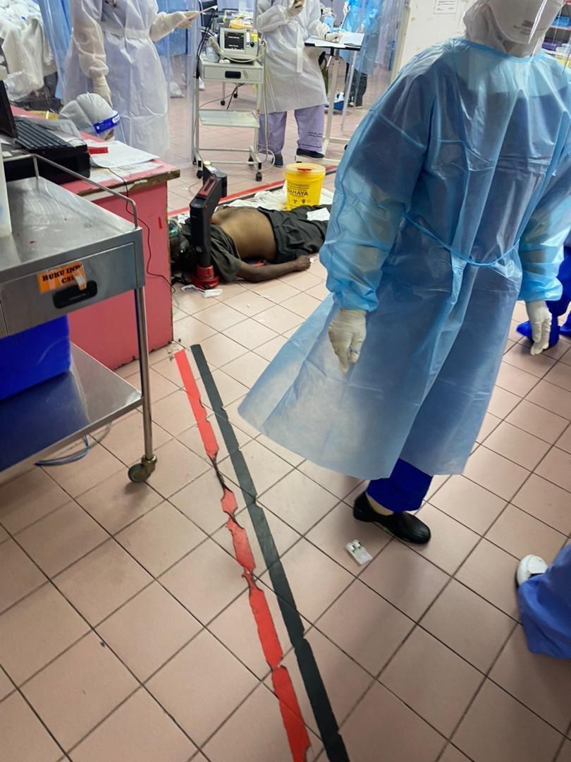 In another photograph taken yesterday, a patient is seen on the floor in HKL on a CPR machine. – Pic courtesy of HKL frontliners, July 4, 2021
