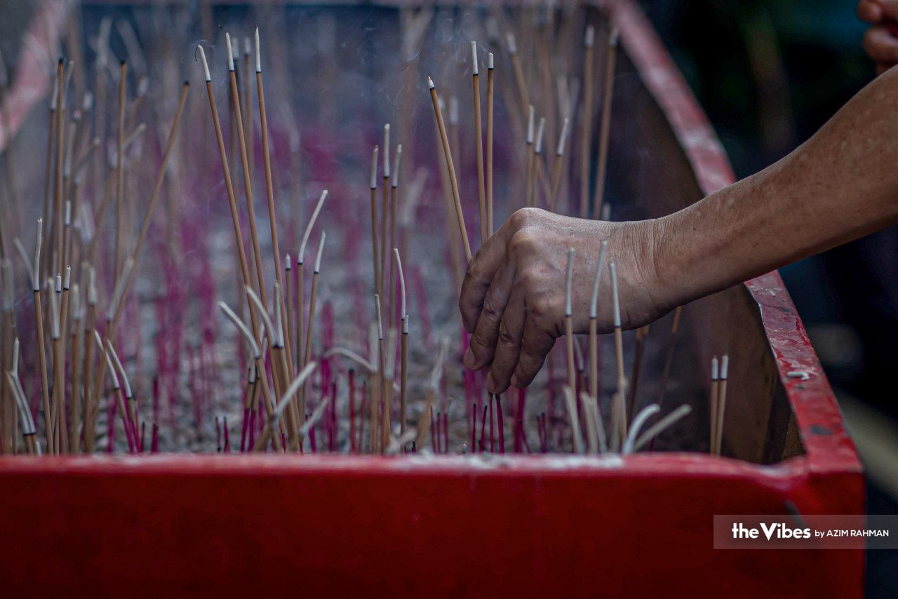 Sticks of incense being burnt at an altar. – AZIM RAHMAN/The Vibes pic, May 4, 2023
