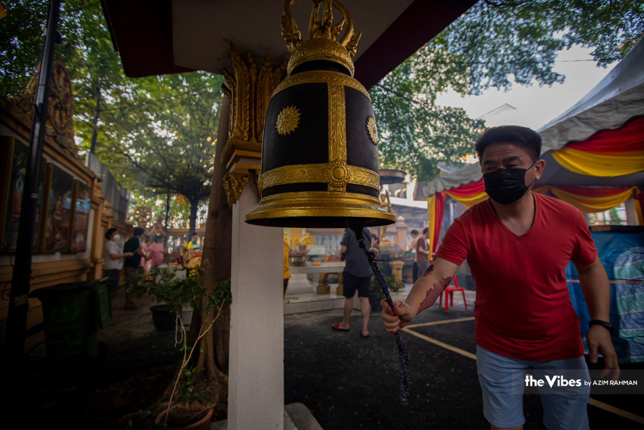 A worshipper rings a bell at the Jayanti Buddhist Temple in Pudu. – AZIM RAHMAN/The Vibes pic, May 4, 2023